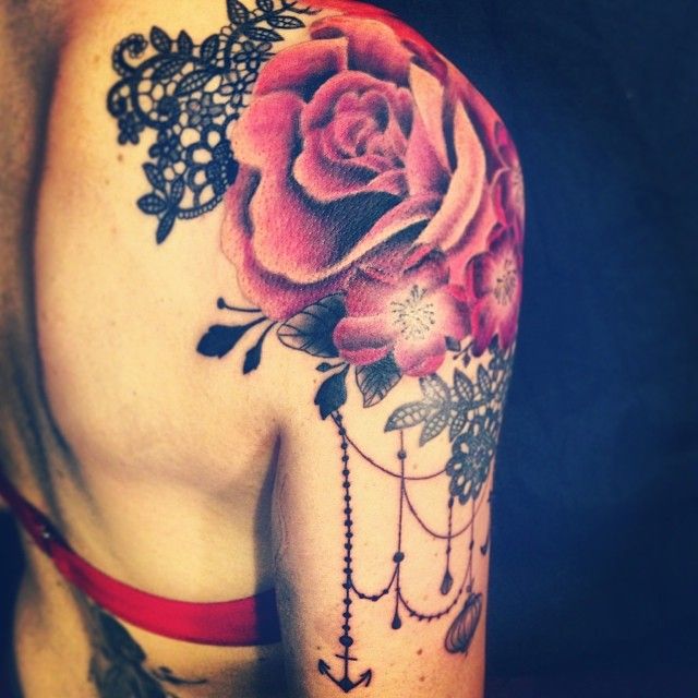 Pink Floral Tattoo On Right Shoulder