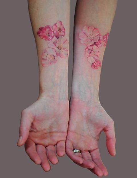 Pink Ink Floral Tattoo On Both Arm