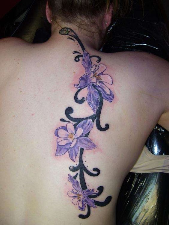 Purple Floral Tattoo On Girl Upper Back