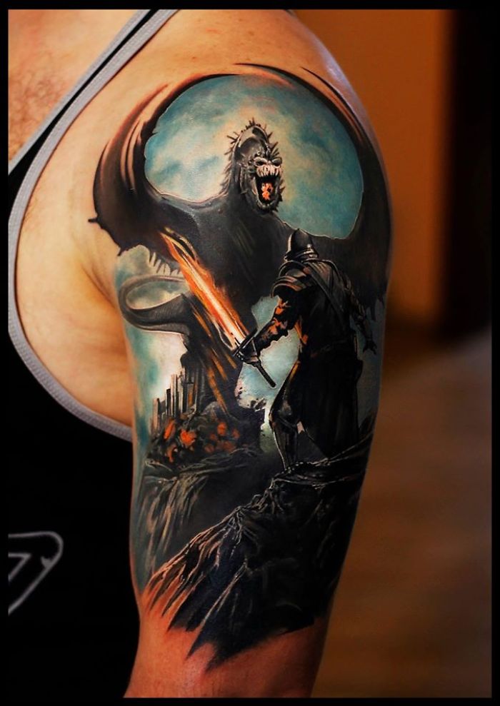 Realistic Colorful Fantasy Tattoo On Left Sleeve