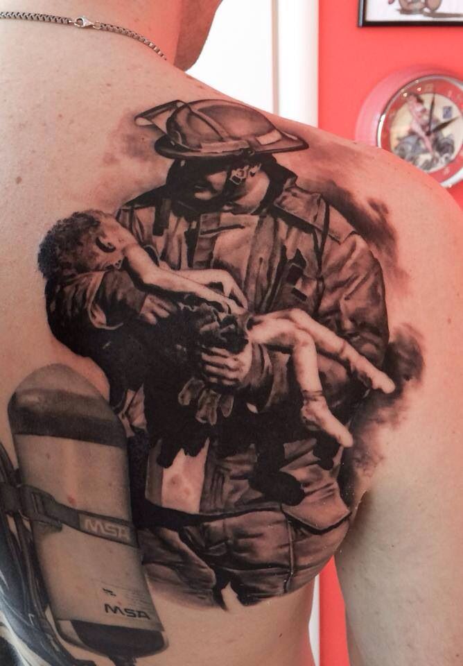Realistic Firefighter Tattoo On Right Back Shoulder
