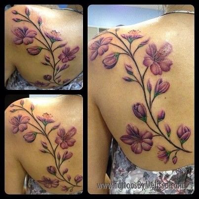 Realistic Floral Tattoo On Girl Left Back Shoulder