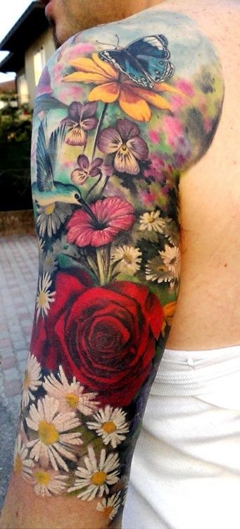 Realistic Floral With Bird And Butterfly Tattoo On Left Half Sleeve