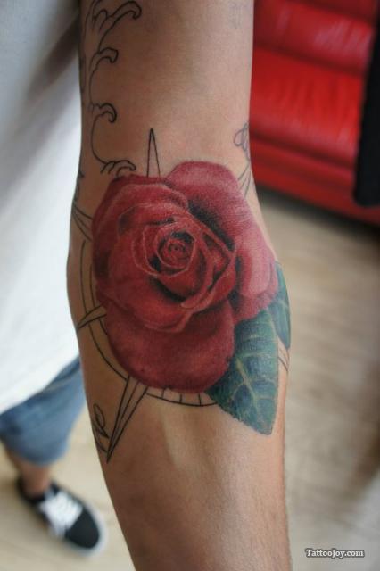Realistic Red Rose Tattoo On Inside Elbow