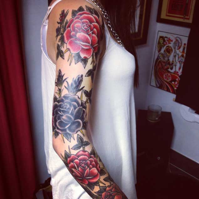 Red And Black Floral Tattoo On Girl Right Full Sleeve