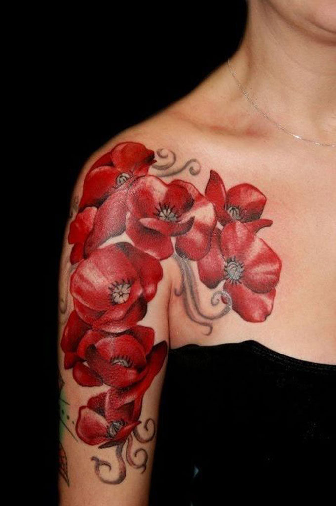 Red Floral Tattoo On Girl Right Front Shoulder