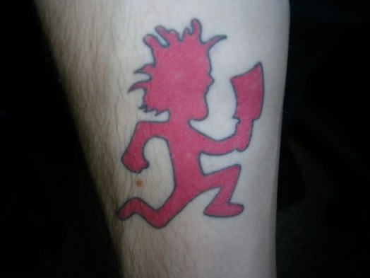 Red Silhouette Juggalo Tattoo On Leg