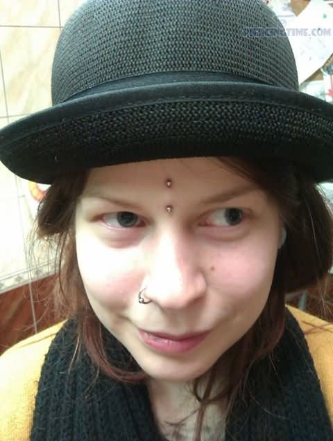 Right Nostril And Vertical Surface Bindi Piercing