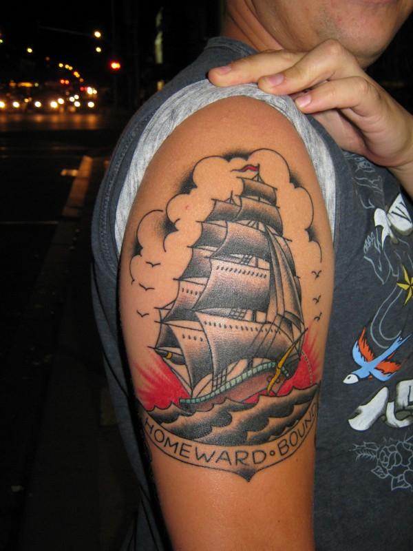 Sailor Ship With Banner Tattoo On Man Right Half Sleeve