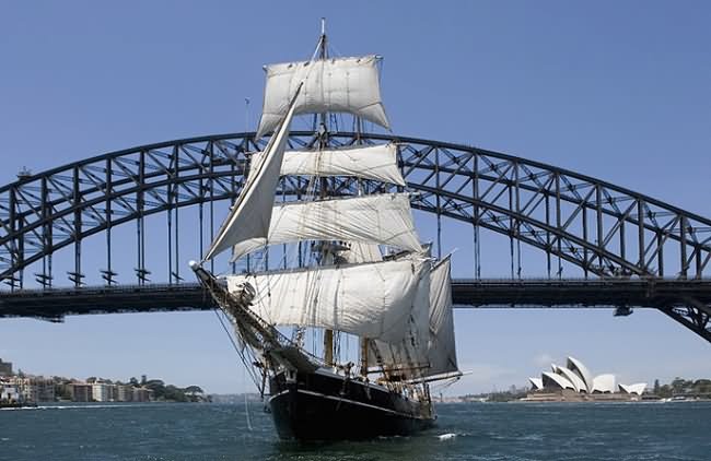 Ship Crossing Sydney Harbour Bridge