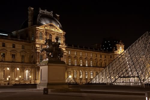 Side View Of Louvre Museum At Night