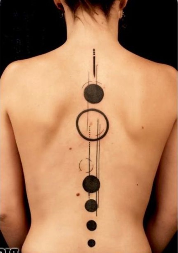 Silhouette Circles Tattoo On Girl Full Back