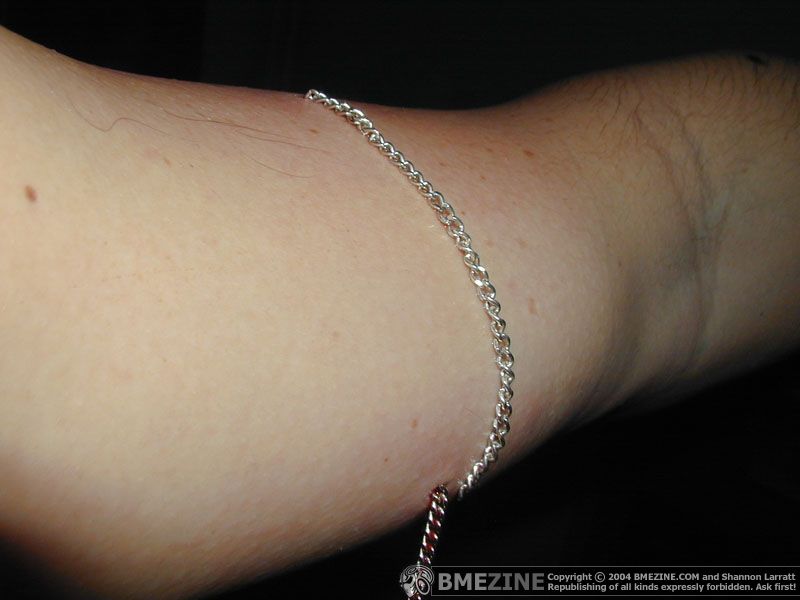 Silver Chain Piercing On Arm