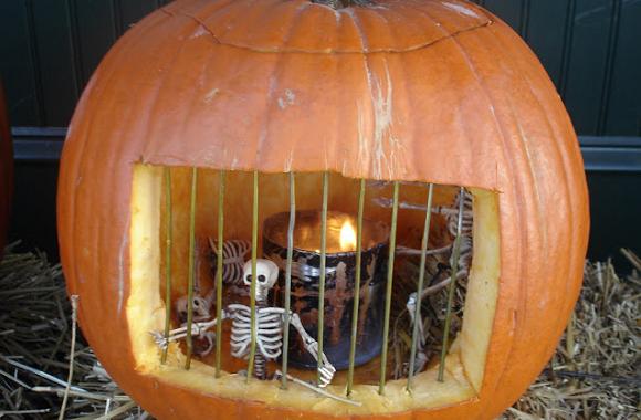 Skeleton In Pumpkin Cage Funny Halloween Image For Whatsapp
