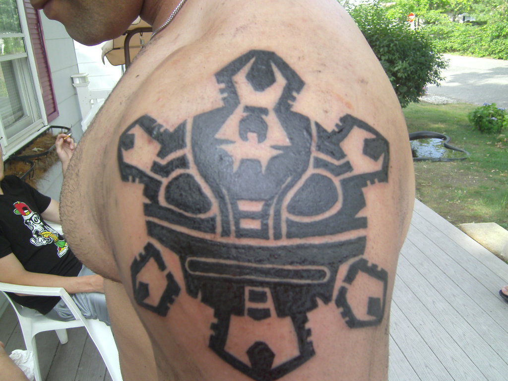 Taino Sun Tattoo On Left Shoulder by Therenegadeartist