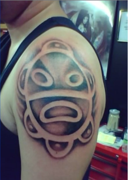 Taino Sun Tattoo On Left Shoulder by tat2joe