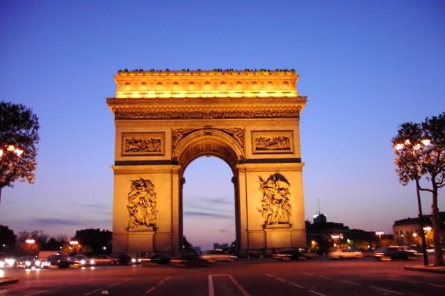 The Arc de Triomphe Lit Up At Night