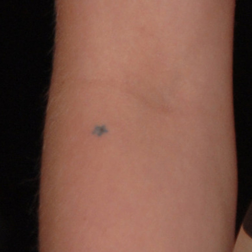 Tiny Star Tattoo On Inside Elbow