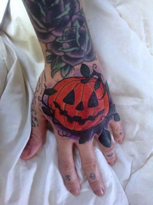 Traditional Halloween Pumpkin Tattoo On Hand