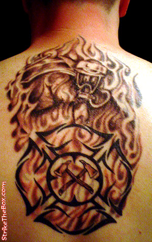 Tribal Firefighter Logo Tattoo On Upper Back