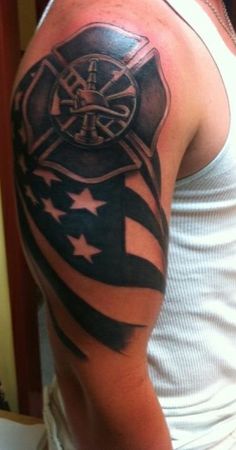 Tribal Firefighter Logo With USA Flag Tattoo On Man Right Half Sleeve