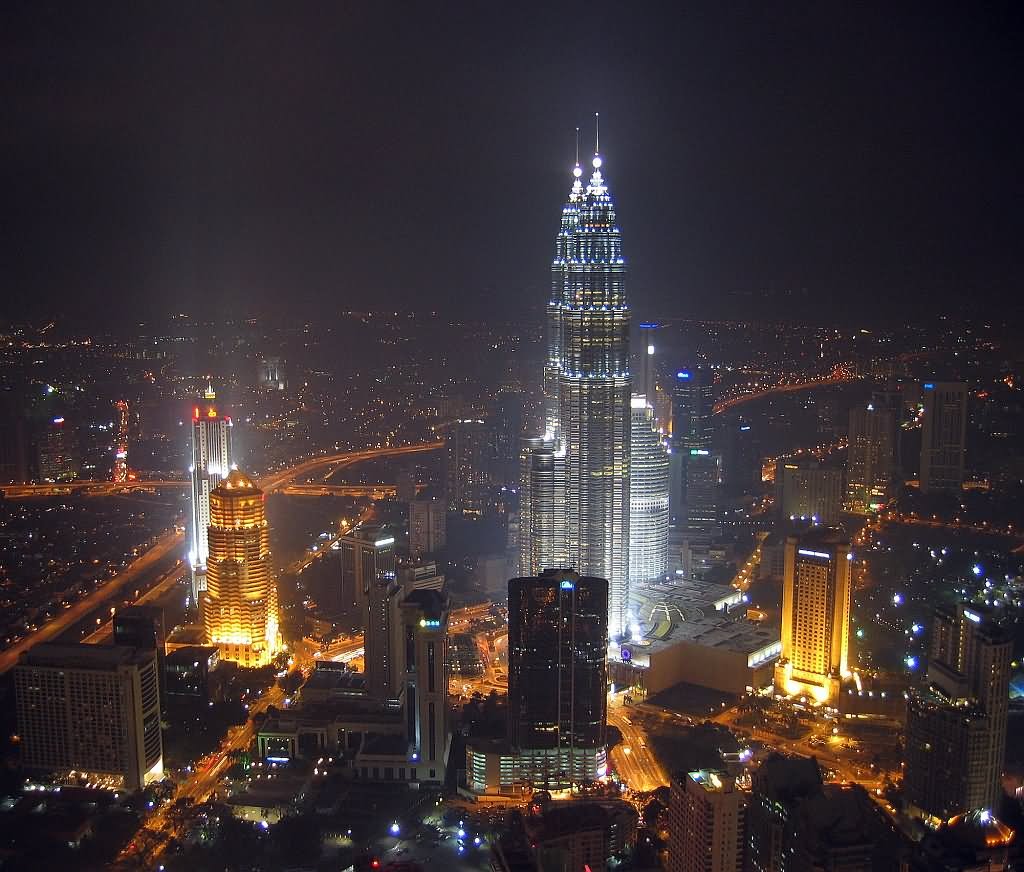 Air View Of Petronas Towers And Kuala Lumpur City At Night