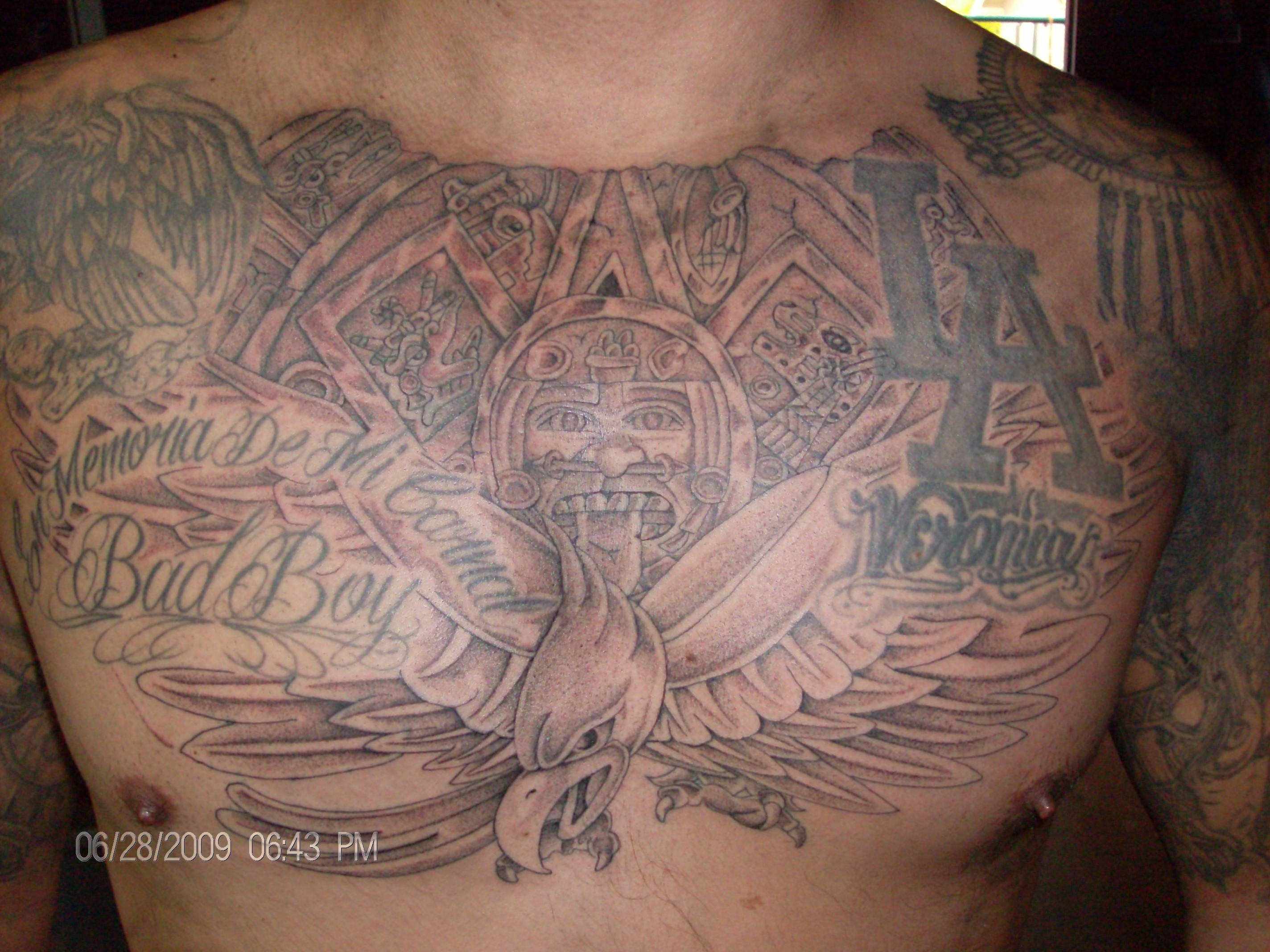 Aztec sun And Mexican Eagle Tattoo On Chest