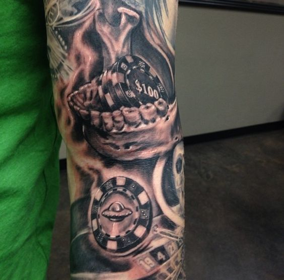 Black And Grey Poker Casino Chips Tattoo On Left Sleeve