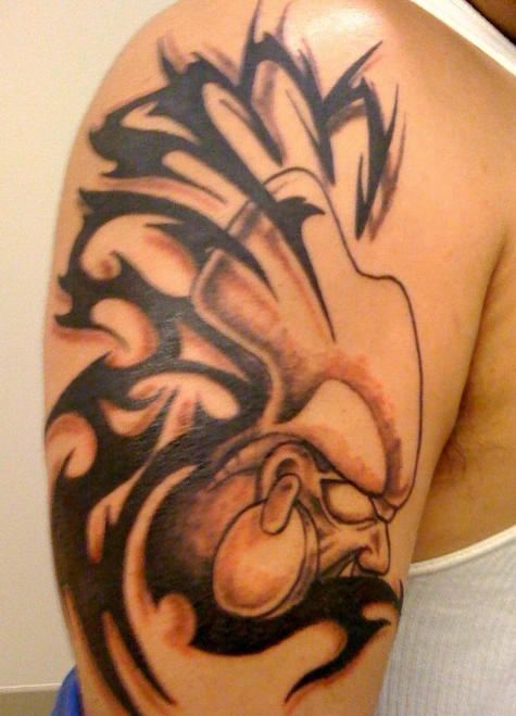 Black Tribal Mexican Tattoo On Man Right Half Sleeve