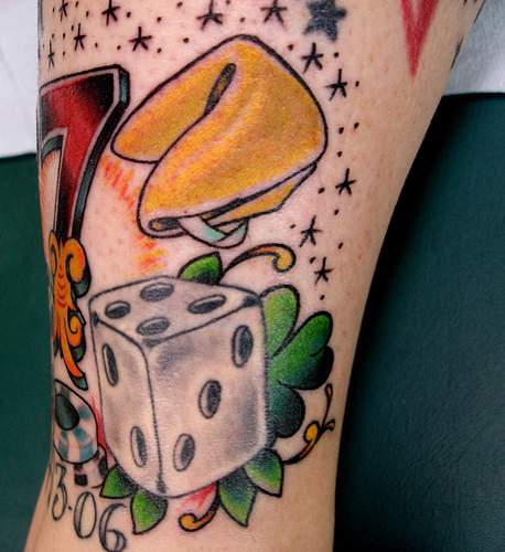 Clover Leaf And Dice Gambling Tattoo On Sleeve