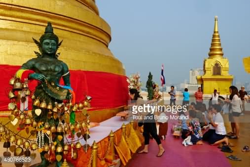 Devotees Worshipping At Wat Saket Temple, Thailand