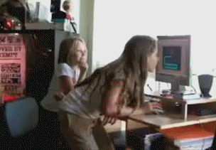 Girls Falling To See Computer Screen Funny Gif Picture
