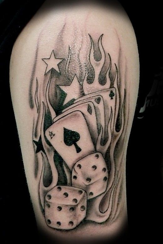 Grey Flaming Dice And Cards Tattoo On Half Sleeve