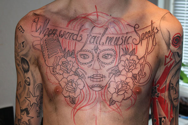 Outline Mexican Chest Tattoo For Men