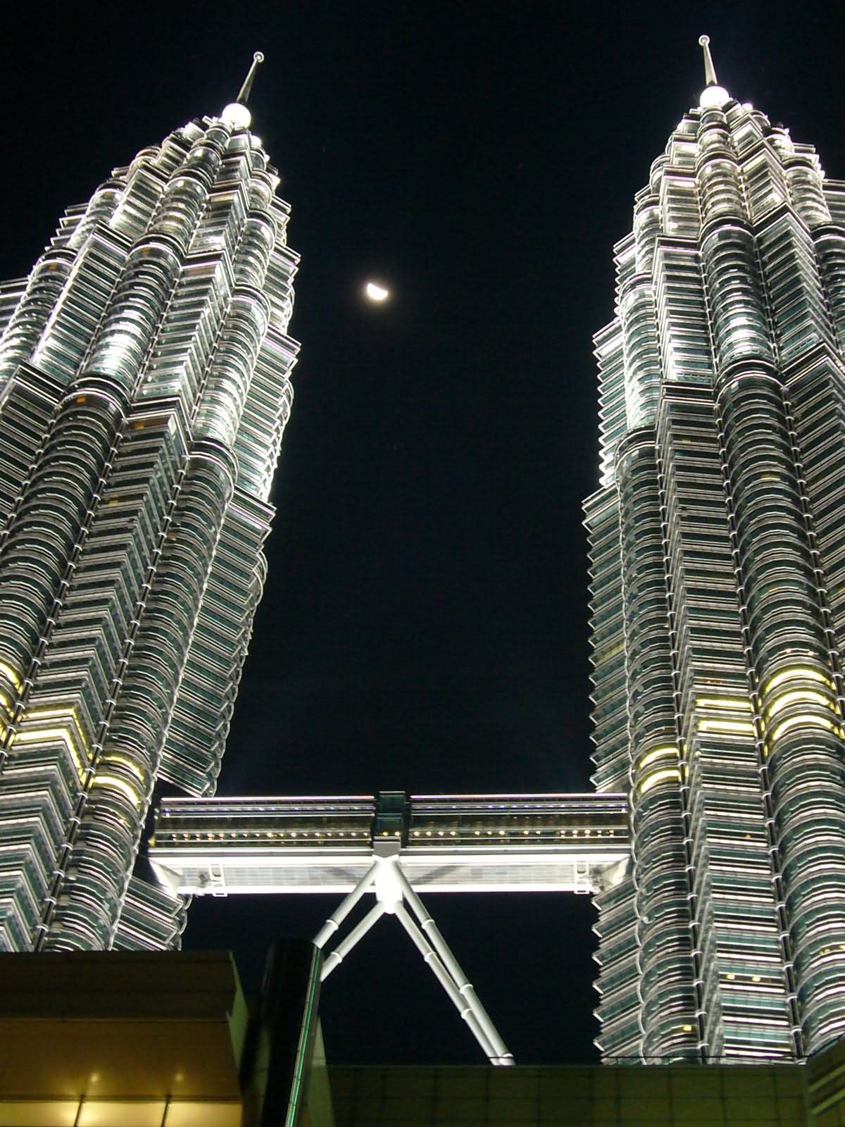Petronas Twin Towers At Night With Moon
