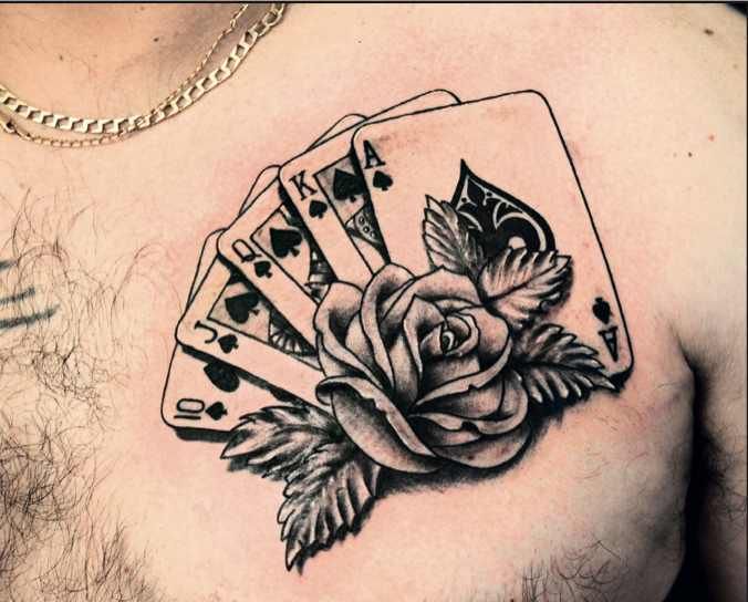 Rose Flower And Playing Cards Gambling Tattoo On Chest For Men