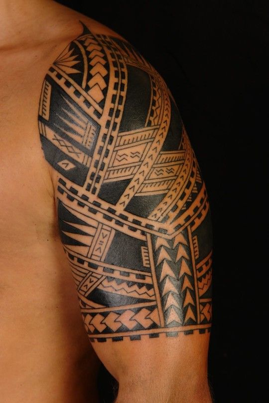 Tribal Mexican Tattoo On Left Half Sleeve