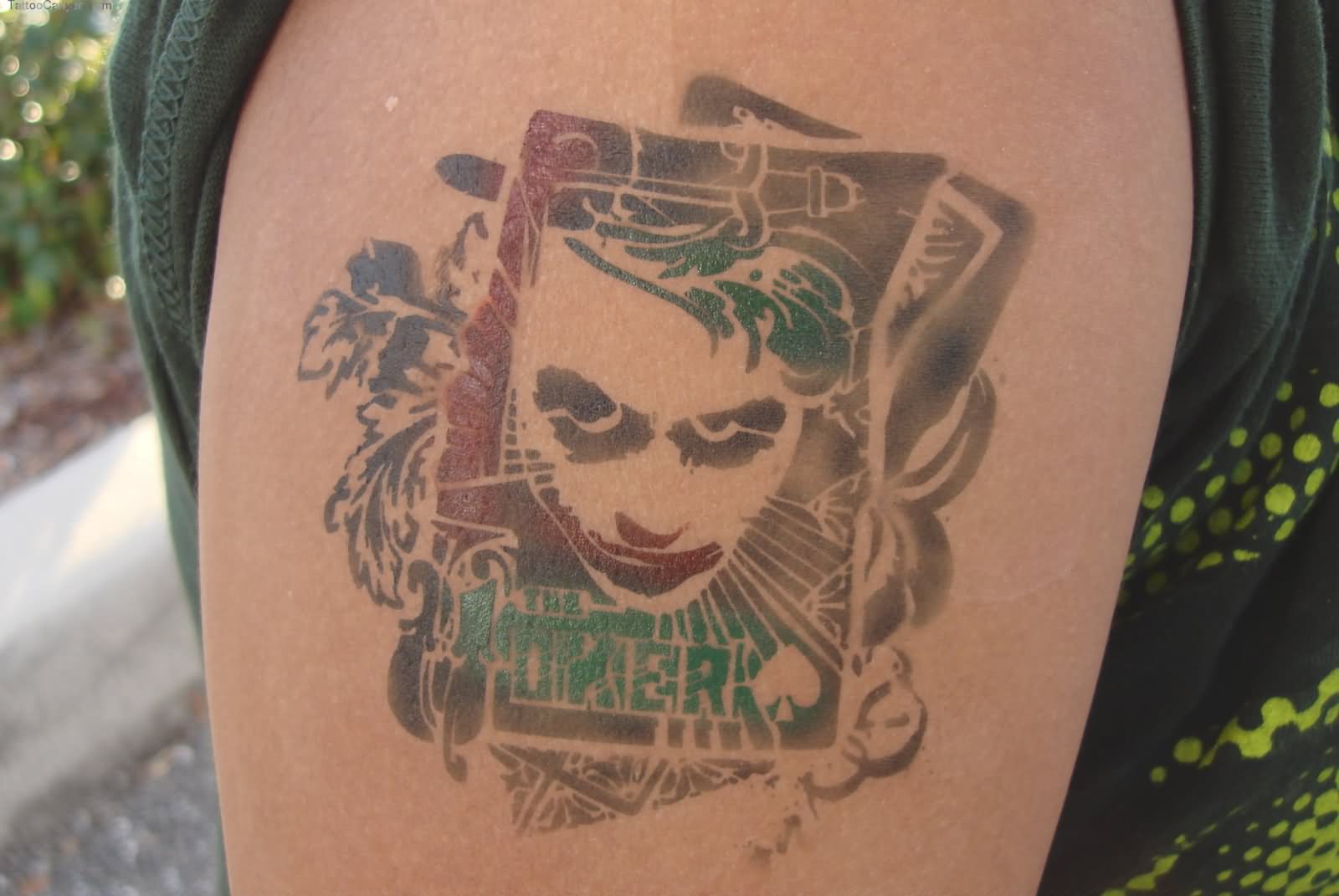 Watercolor Gambling Joker Tattoo On Shoulder