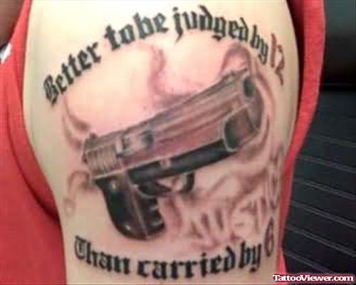 Black And Grey Gangster Gun Tattoo Design For Shoulder