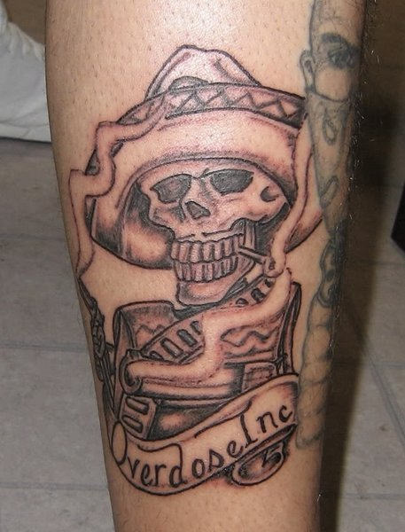 Black Ink Smoking Mexican Gangster Skull With Banner Tattoo Design For Leg