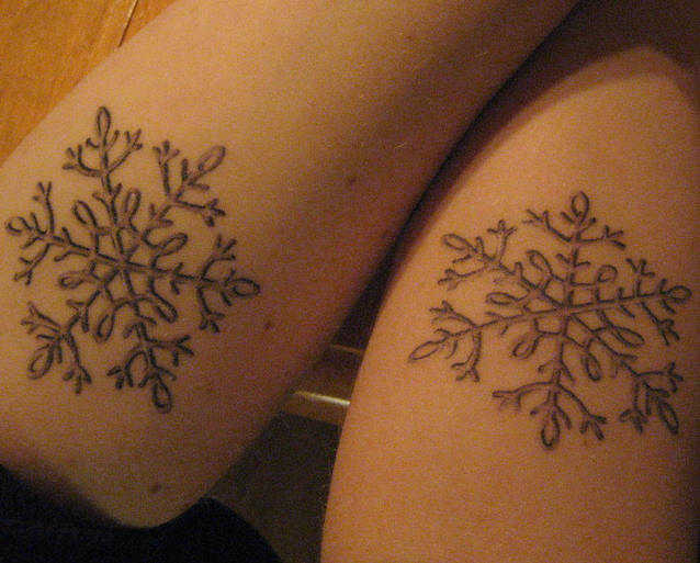 Grey Snowflakes Friendship Tattoo On Arm