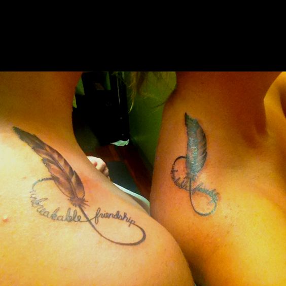 Infinity Friendship With Feather Tattoo On Upper Shoulder
