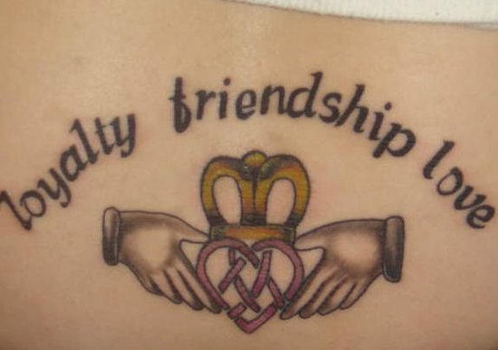 Loyalty Friendship Tattoo On Lower Back