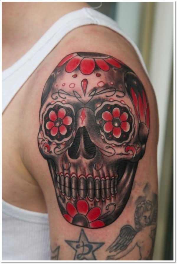 Red And Black Mexican Gangster Skull Tattoo On Shoulder By Heinz Graynd