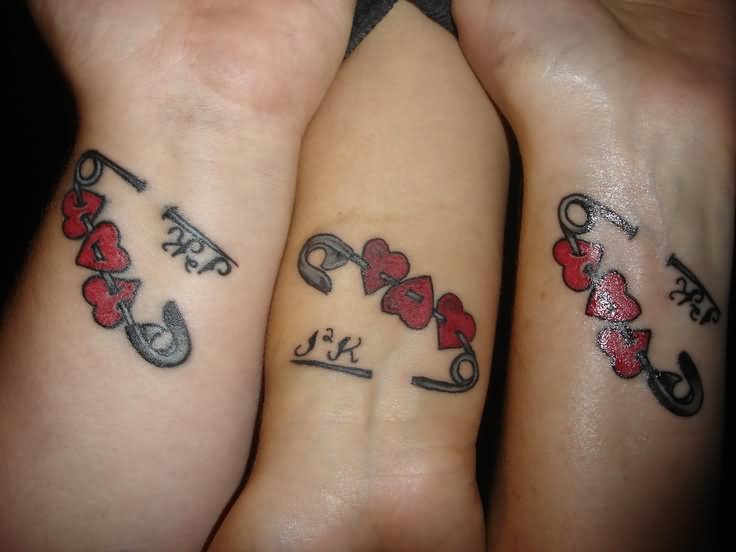 Red Hearts In Safety Pin Friendship Tattoos