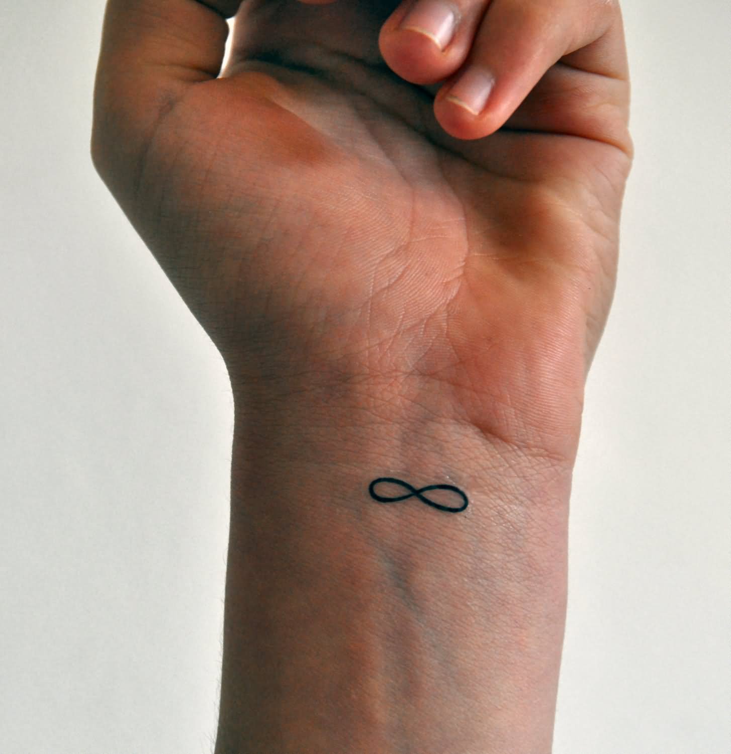 Small Infinity Friendship Symbol Tattoo On Wrist