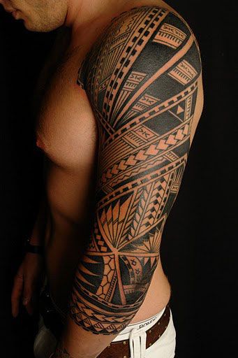 Amazing Hawaiian Design Tattoo On Man Left Full Sleeve