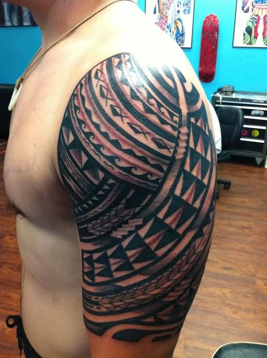 Ancient Hawaiian Design Tattoo On Man Left Shoulder
