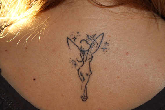 Attractive Black Outline Tinkerbell Tattoo Design For Upper Back