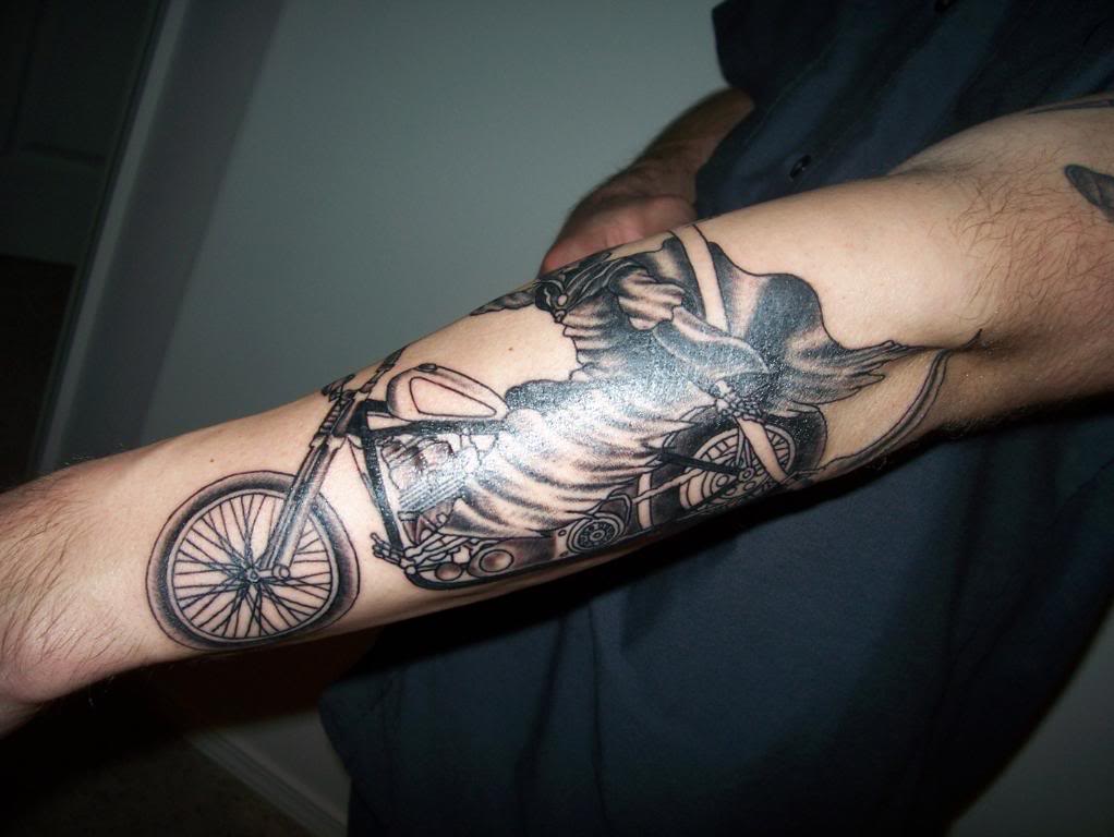 Black And Grey Motorbike Tattoo On Left Sleeve